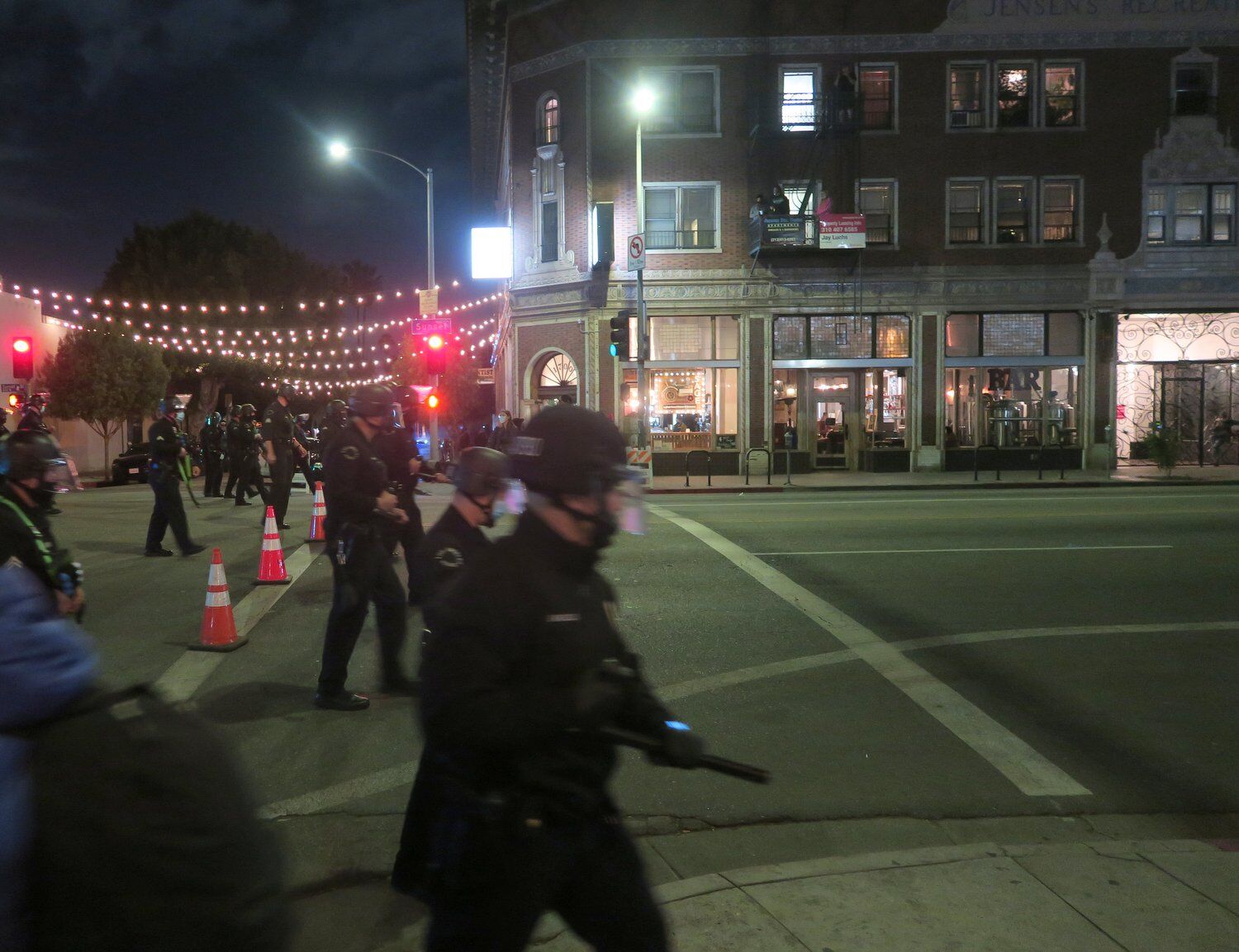 Police and protester standoff in echo park